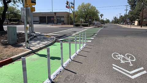 Bike boulevard with green bike lane, bike arrows, fire station 7