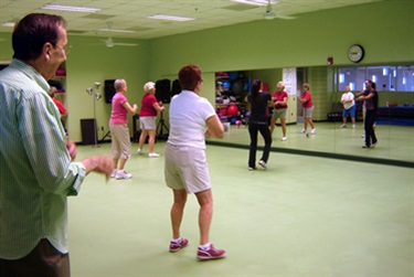 Senior taking part in the Enhance Fitness Program