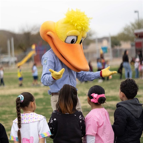 Tucson Water's mascot, Pete the Beak speaks to a class of fourth graders
